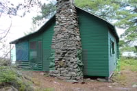 West facade of Jun Fujita’s cabin, 2025